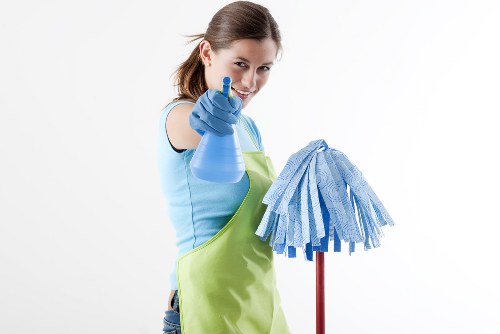Carpet cleaning team preparing a safe workspace before service begins